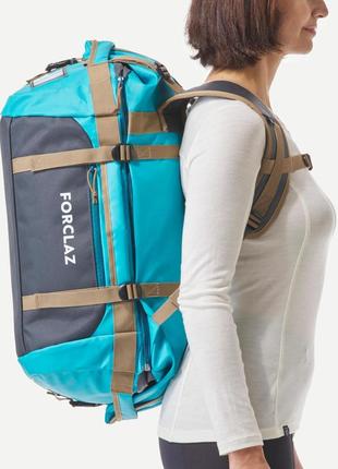 Спортивная дорожная сумка/рюкзак для трекинга forclaz 40-60л 55 x 40 x 32см синий7 фото