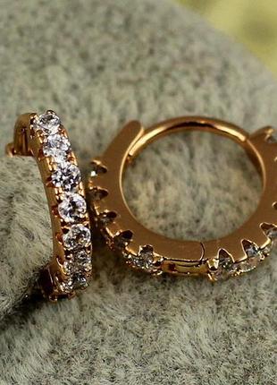 Сережки xuping jewelry доріжка з каменів спереду та ззаду 1.2 см золотисті