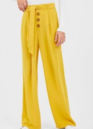 Желтые брюки с ремешком stradivarius1 фото