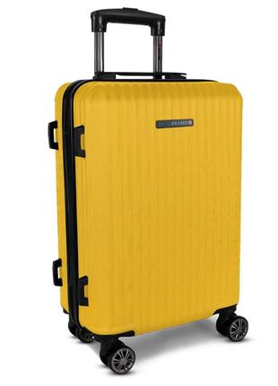 Большой чемодан пластиковый swissbrand riga 103 л желтого