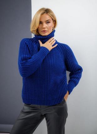Женский вязанный свитер с высоким воротом синего цвета. модель 27081 фото