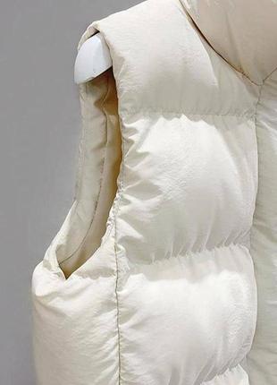 Женская жилетка