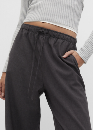 Брюки с карманами