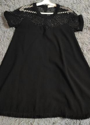 Черное женское платье свободного кроя.2 фото