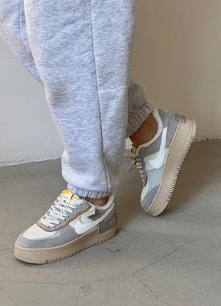 Утепленные мехом кроссовки nike air force 19 фото