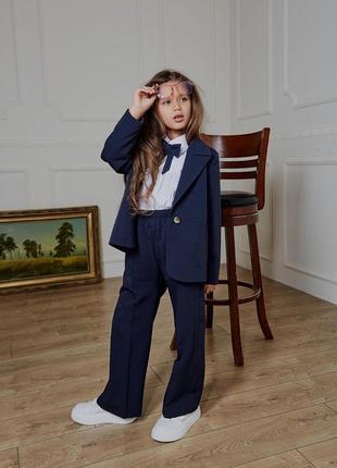Костюм дитячий підлітковий брючний для дівчинки однобортний піджак штани шкільний темно-синій