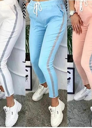 Штани блакитні рвані