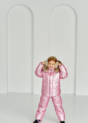 Зимовий костюм куртка та штани для дівчинки рожевий на флісі з хутром єнота на капюшоні