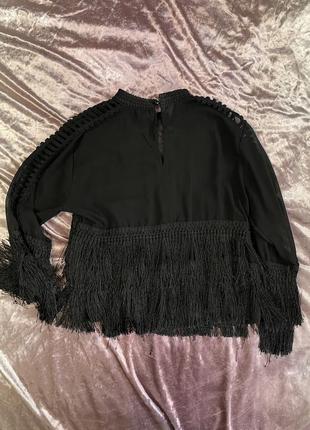 Блуза черного цвета с бахромой2 фото