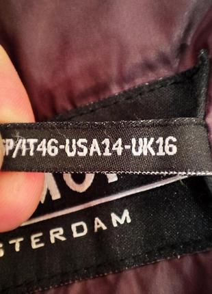 Легкий пуховик.