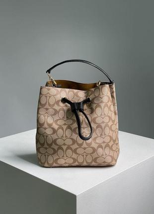 Стильна жіноча сумка coach willow shoulder bag in signature canvas cream 23 х 21 х 13 см6 фото