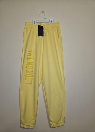 Жовті штани спортивні