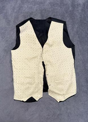 Дитячий жилет ошатний