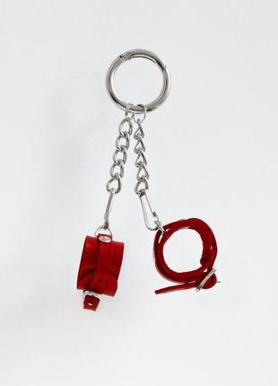 Брелок наручники с пряжкой красный feromon