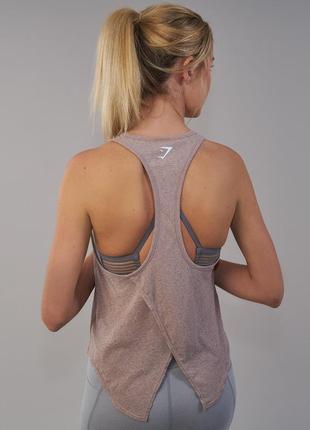Майка вільного крою з розрізом на спині gymshark aura vest1 фото