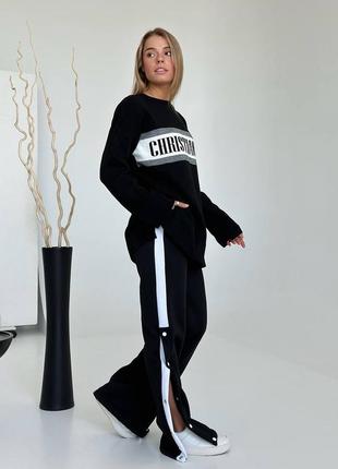 Теплые брюки клеш на кнопках на флисе