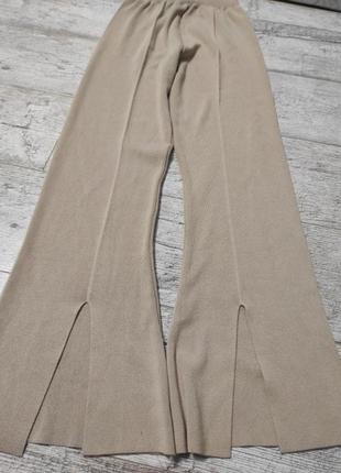 Женские брюки, лосины, клеш спереди разрез3 фото