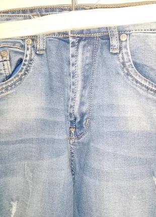 Модные рваные джинсы buddy boy б/у подростковые на мальчика размер 24/150 синие4 фото