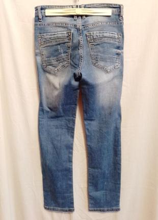 Модные рваные джинсы buddy boy б/у подростковые на мальчика размер 24/150 синие5 фото