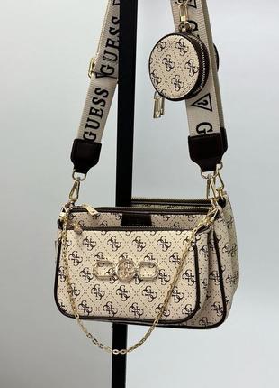 Сумка guess pochette multi cream2 фото