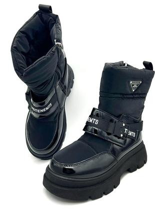 Зимние женские ботинки черного цвета.2 фото