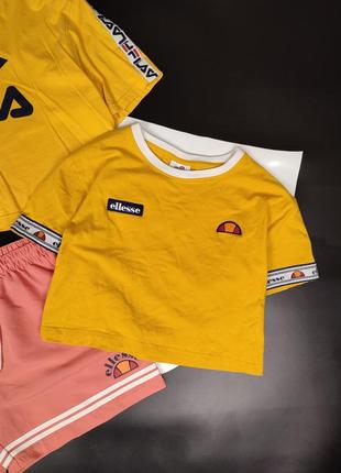 Топ ellesse