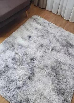 Хутряний ворсистий світло-сірий килимок травка меланж 160х120 см із довгим ворсом, знизу прорезинені вставки