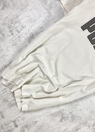 Стильная белая футболка puma с серым логотипом: ваша модная эссенция3 фото