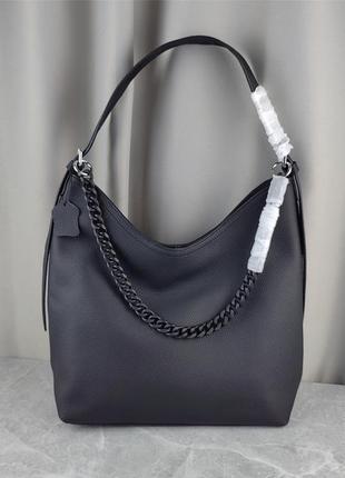 Жіноча шкіряна велика чорна сумка-мішок1 фото