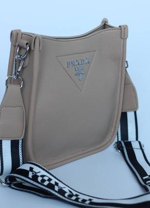 Мягкая женская сумка клатч барсетка в бежевому цвета prada8 фото