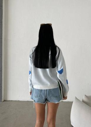 Женский свитер с сердечками9 фото