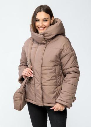 Зимова жіноча куртка з капюшоном та сумкою в комплекті.  розміри 44 46 48 504 фото