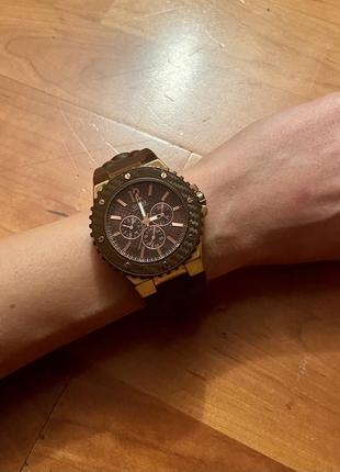 Ручний годинник guess, шоколадний колір. унісекс1 фото