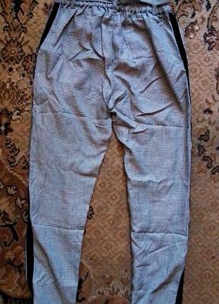 Черные классические женские брюки7 фото