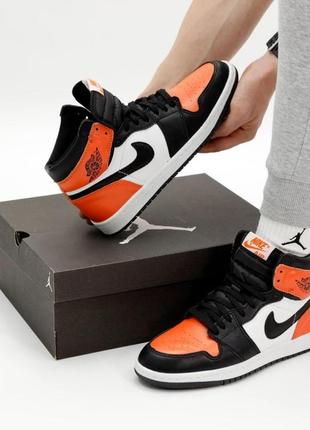 Мужские кроссовки nike air jordan 1 mid orange black white 41-42-43-44-456 фото