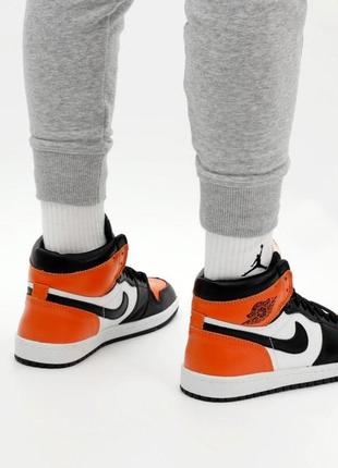 Мужские кроссовки nike air jordan 1 mid orange black white 41-42-43-44-457 фото