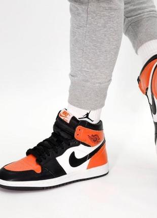 Мужские кроссовки nike air jordan 1 mid orange black white 41-42-43-44-453 фото