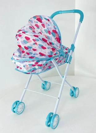 Іграшкова коляска для кукол лежача металева2 фото