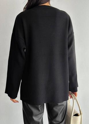 Жіночий вязаний подовжений светр чорний стильний теплий мякий приємний оверсайз тренд сезону5 фото