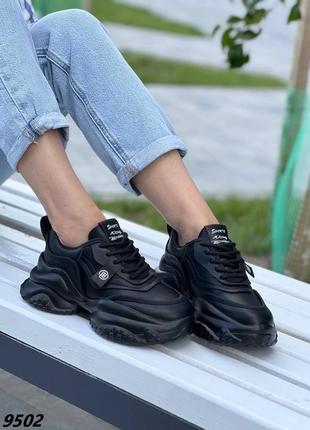 Жіночі чорні кросівки7 фото