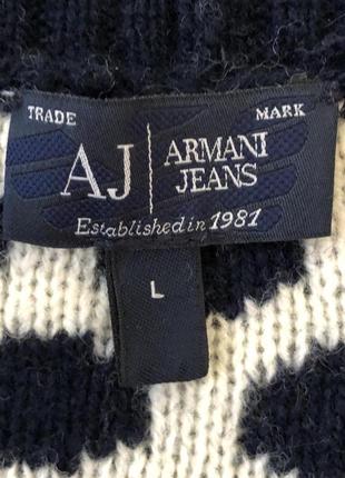 Шикарный и модный свитер-пончо фирмы armani, очень стильный дизайн, тренд в этом году, качественная и приятная ткань на ощупь, 70% шерсти.5 фото