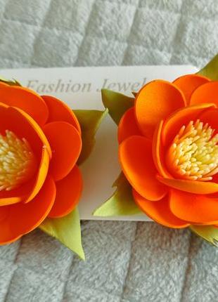 Резинки с оранжевыми цветочками