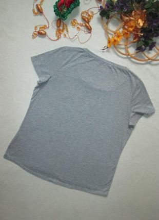 Классная стрейчевая футболка серый меланж с цветочной отделкой george7 фото