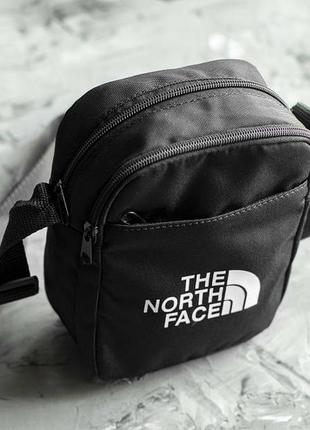 Маленькая стильная сумка месенджер мужская the north face baf чорная тканевая через плечо барсетка4 фото