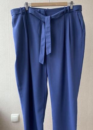 Брюки з защипами