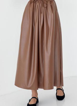Женская юбка фасона полусолнце из эко кожи.8 фото