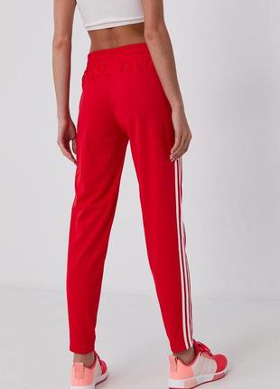 Спортивные штаны adidas essentials 3-stripes red w2 фото