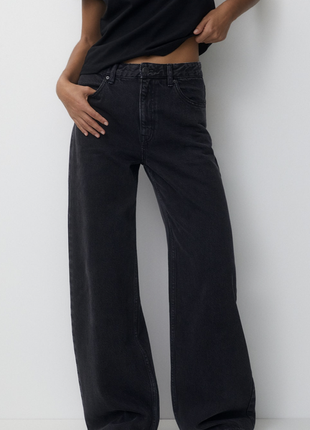Стильные черные широкие джинсы1 фото
