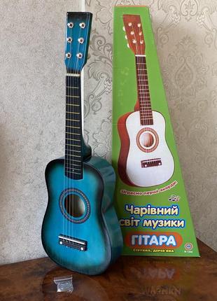 Деревянная гитара с медиатором детская1 фото