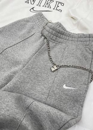 Спортивные штаны nike джоггеры свободного кроя на резинках стильные базовые найк черные серые хаки розовые8 фото